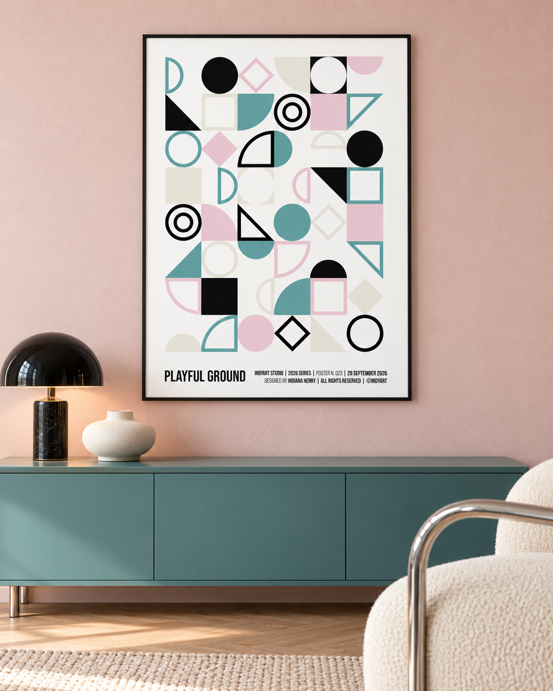 Playful Ground geometric A2 poster in teal, pink and black, styled on a pink wall above a teal sideboard.