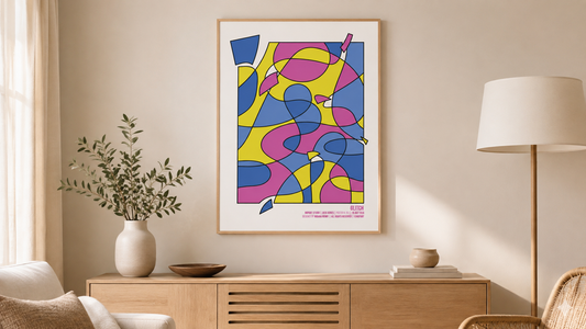 Colorful abstract Glitch poster displayed in a light wood frame above a sideboard in a warm neutral living room.