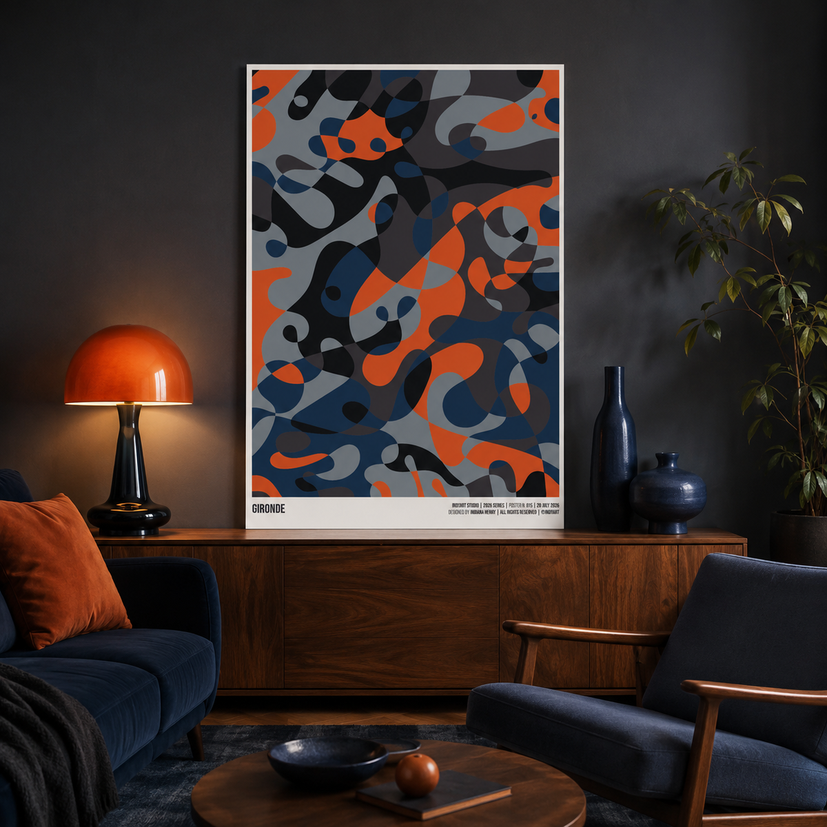 Gironde A2 poster displayed in a dark modern living room with an orange lamp and navy seating