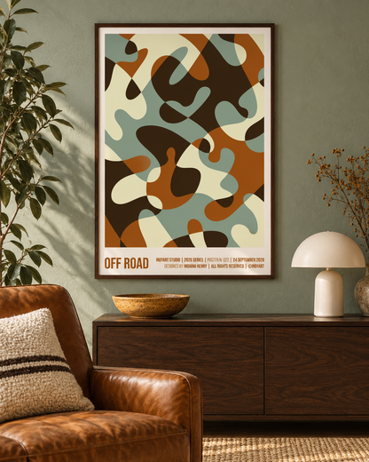 Off Road abstract A2 poster in sage green, ochre and chocolate, styled above a dark wood sideboard beside a cognac leather chair.